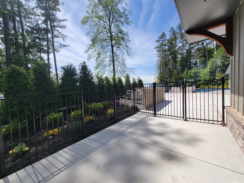 Black aluminum pool and patio fence